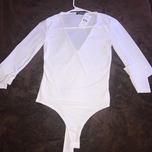 All white long sleeve bodysuit